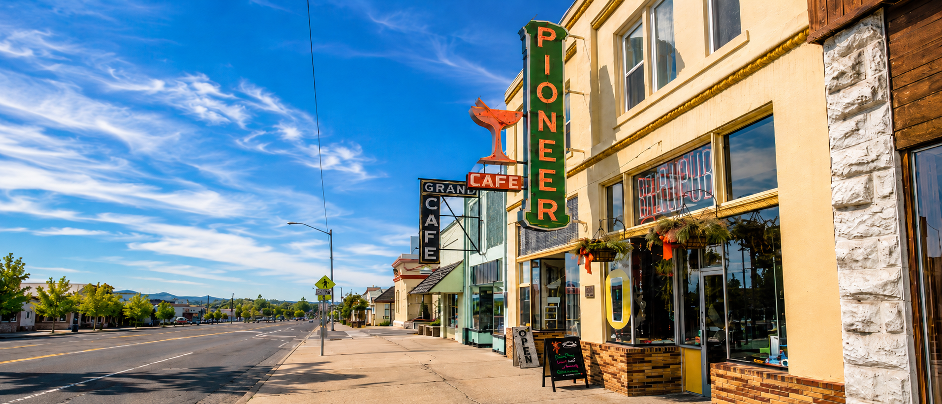 Historic Main Street storefronts in downtown Susanville, California at dusk